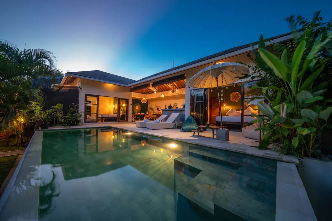 Karma House exterior and private pool at dusk