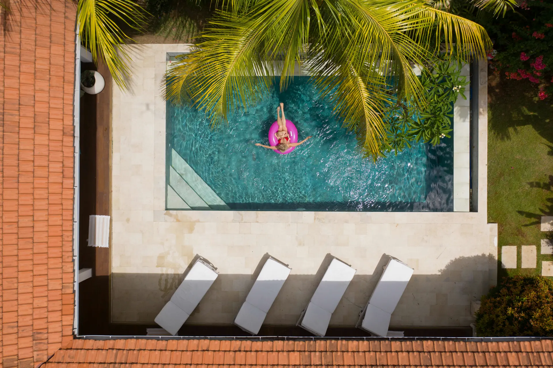 Private tropical villa and pool surrounded by lush greenery in Bali