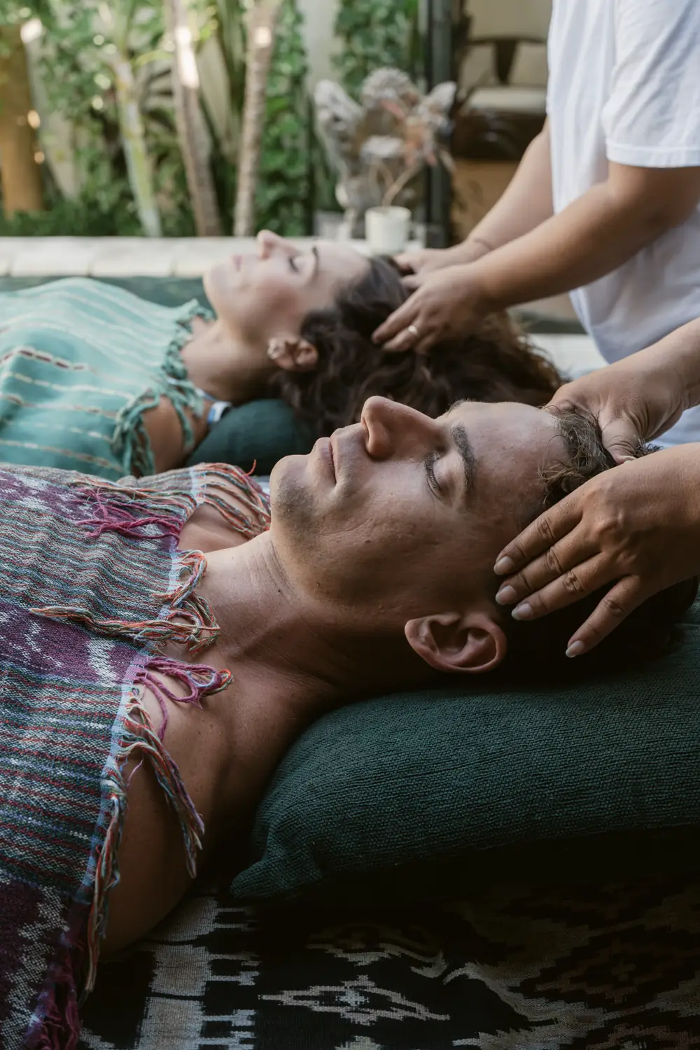 In-villa Balinese massage prepared beside a private pool